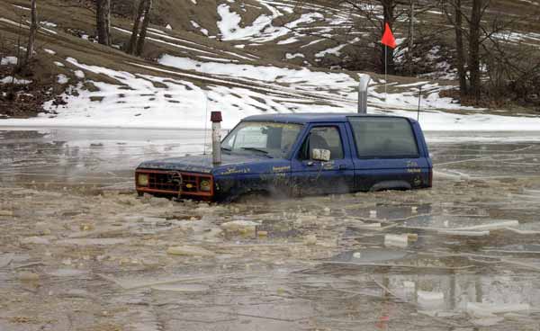 Tristan's Bronco in the lake