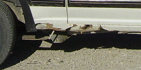 The Ho - rust on the passenger sill