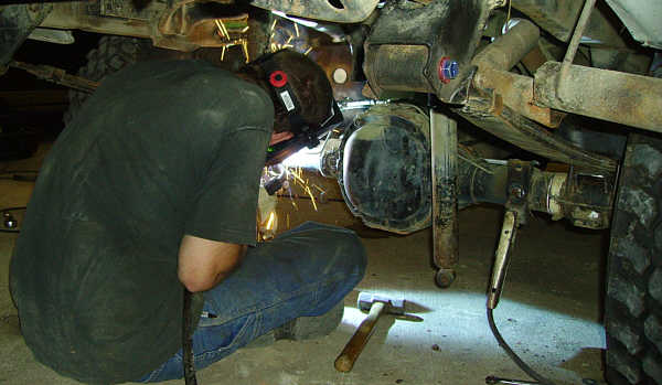 The Ho - Andy welding new rear shock absorber bolts