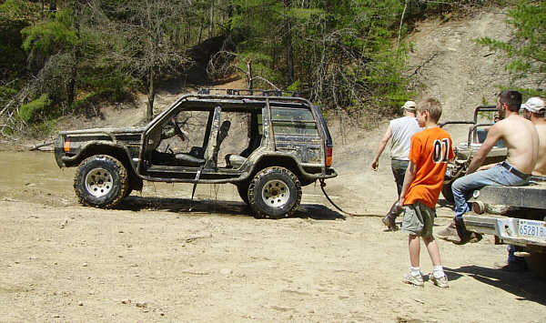 Water draining from Will's Cherokee